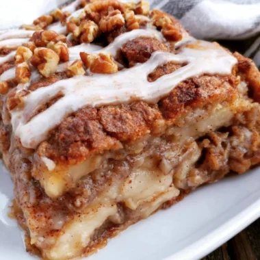 Delicious homemade Apple Oat Breakfast Cake served on a rustic plate