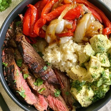 High protein steak fajita bowl with fresh vegetables and spices