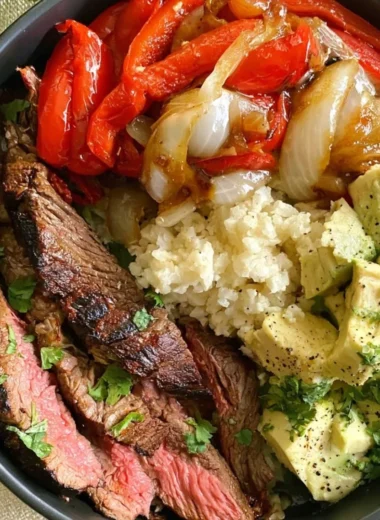 High protein steak fajita bowl with fresh vegetables and spices
