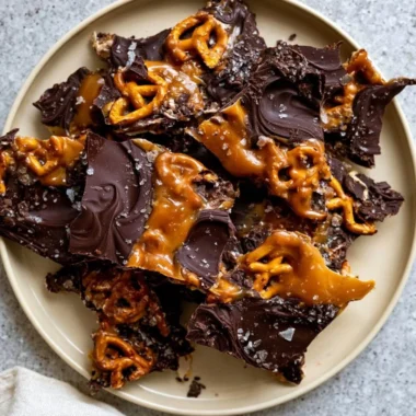 Delicious salted caramel chocolate pretzel bars topped with drizzled chocolate.