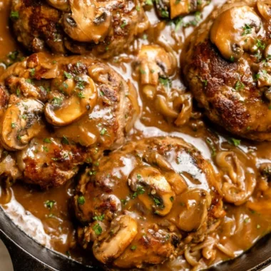 Delicious homemade Salisbury steak served with gravy and mashed potatoes